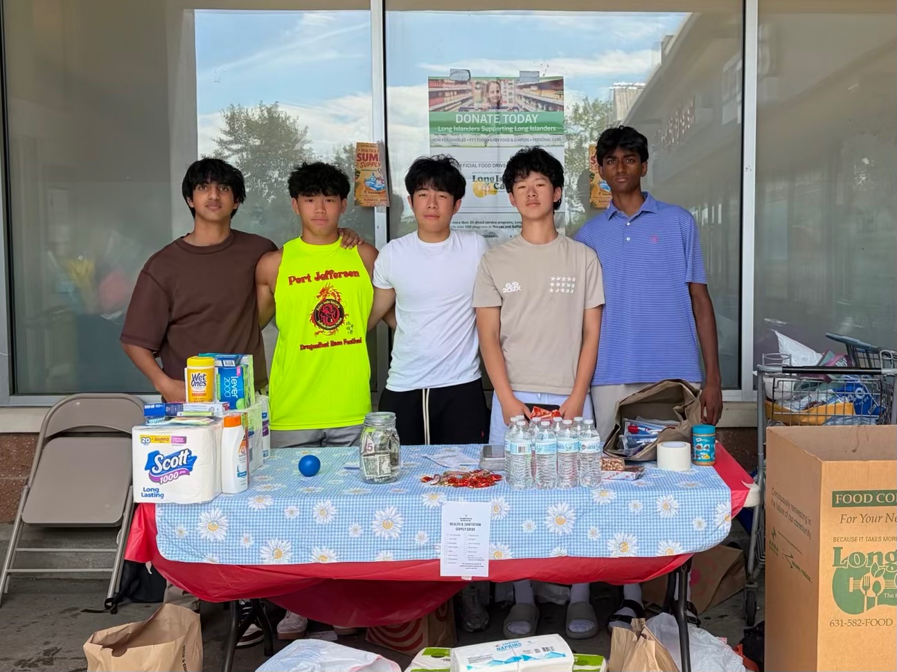 Paeonia student volunteers at a community health and sanitation supply drive
